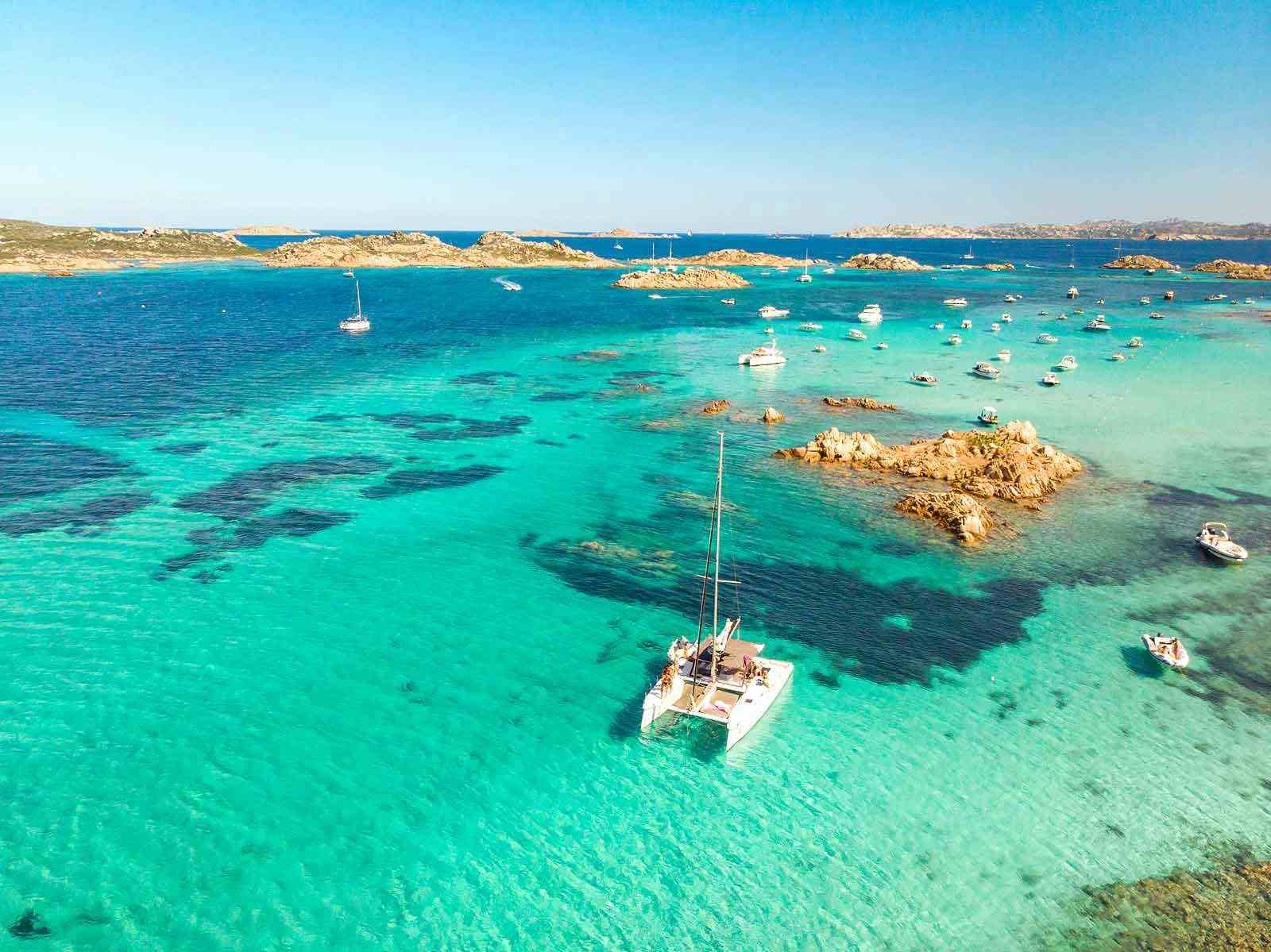 catamaran-sailing-boat-in-Maddalena-Archipelago,-Sardinia,-Italy.jpg