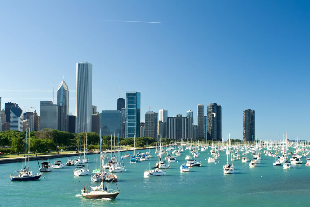 The Best Places for Sailing in the US: 8 Amazing Holiday Destinations 8 You can see the skyline of Chicago and many sailboats anchoring in front of it, clearly making it one of the best places for sailing in the US