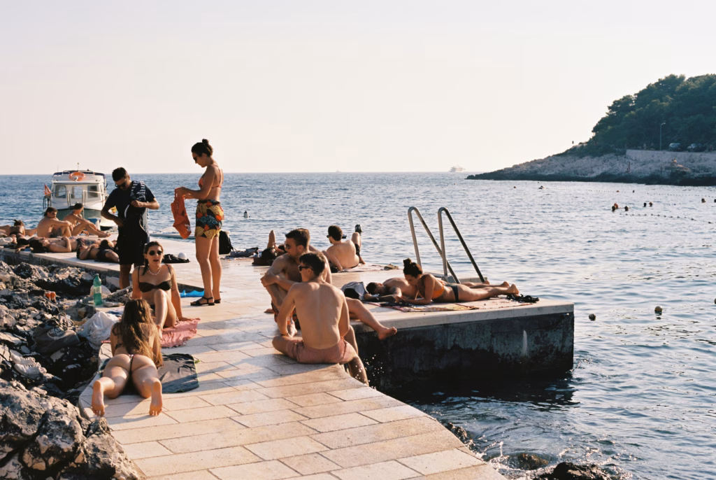 People enjoying the evening sun at a beach in Croatia