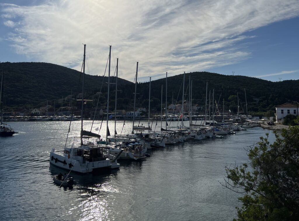 charter boats anchored with shore lines
