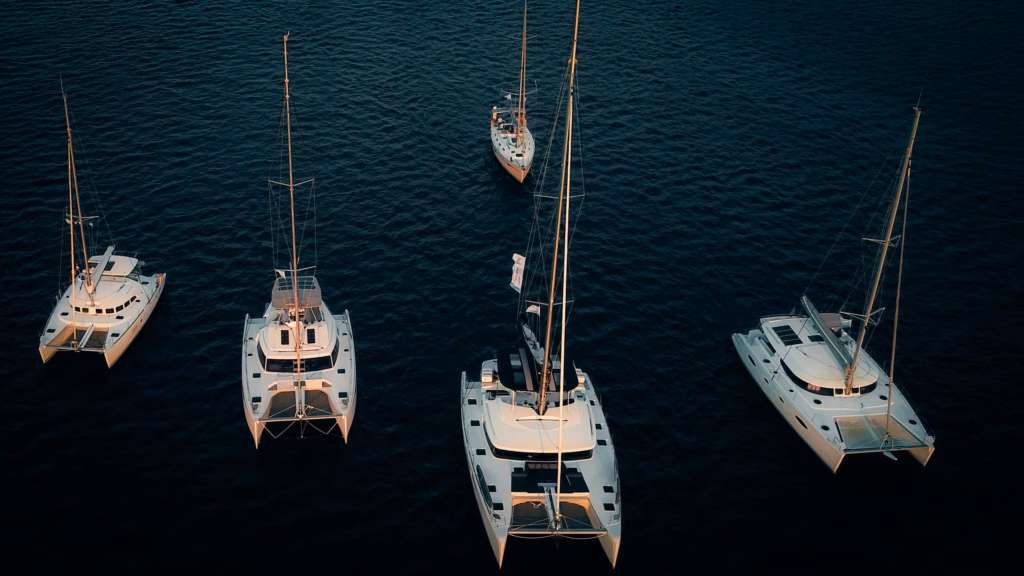 Yacht types compared: bareboat sailing yacht, catamaran, and crewed yacht